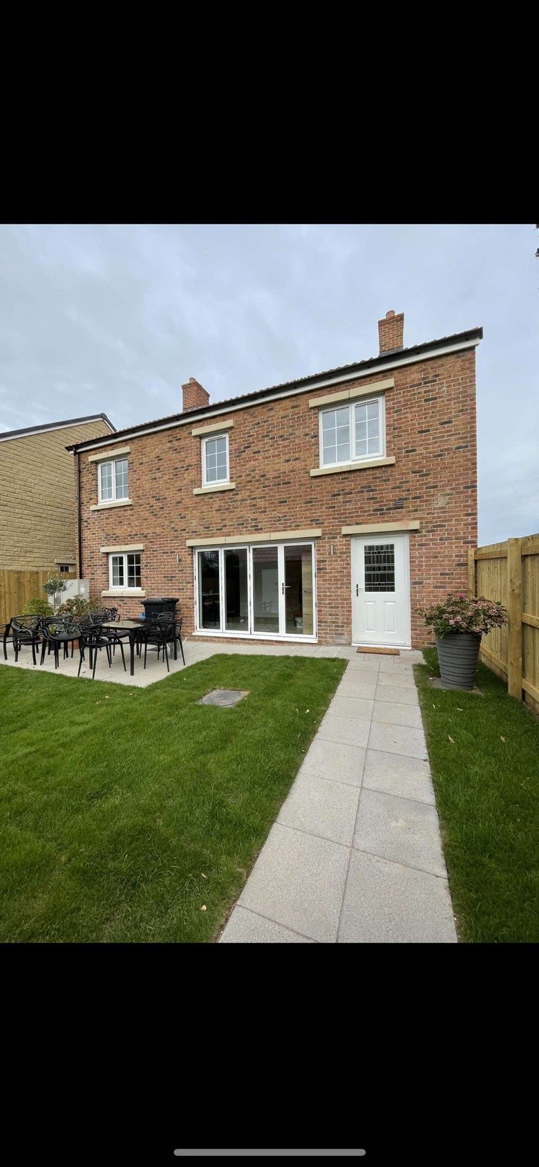 Completed brick house and patio project
